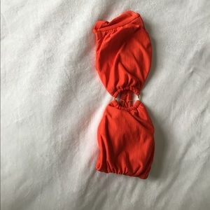 Orange Bandeau Swimsuit with Gold ring in middle